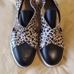 Restricted Black and Cream Polka Dot Flats